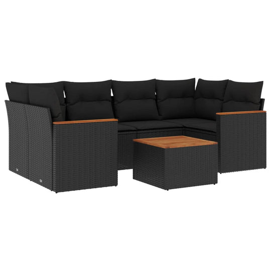 7 Piece Garden Sofa Set with Cushions Poly Rattan in an outdoor setting with black cushions and a wooden coffee table.