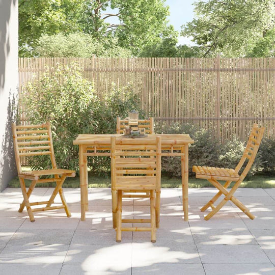 Bamboo folding garden chairs and table set for outdoor dining, featuring elegant design and durable materials.