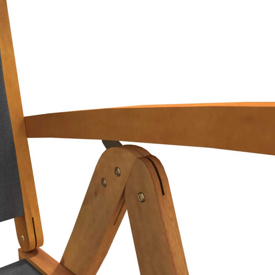 Close-up of adjustable armrest and folding mechanism on solid acacia wood garden chair for outdoor furniture.