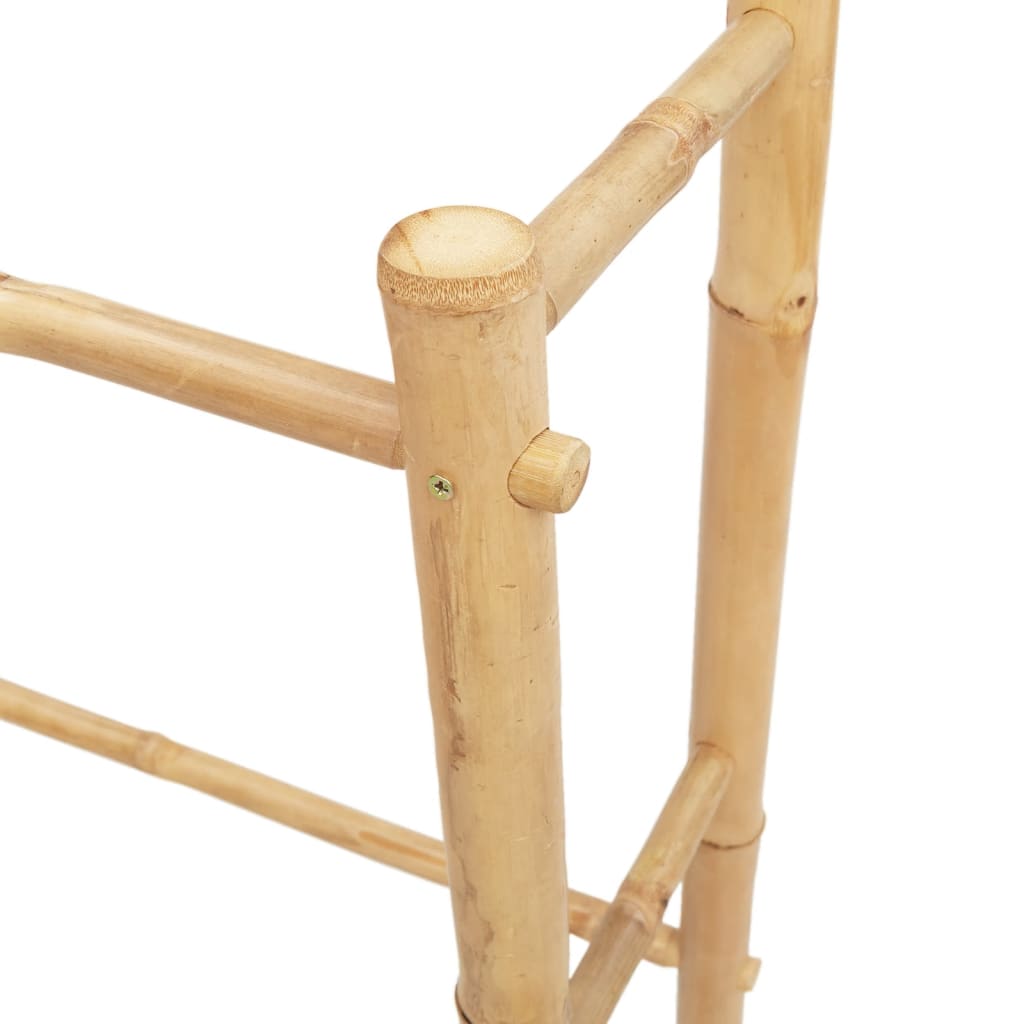 Close-up of a bamboo clothes rack showcasing its stable structure and natural finish for durable storage solutions.