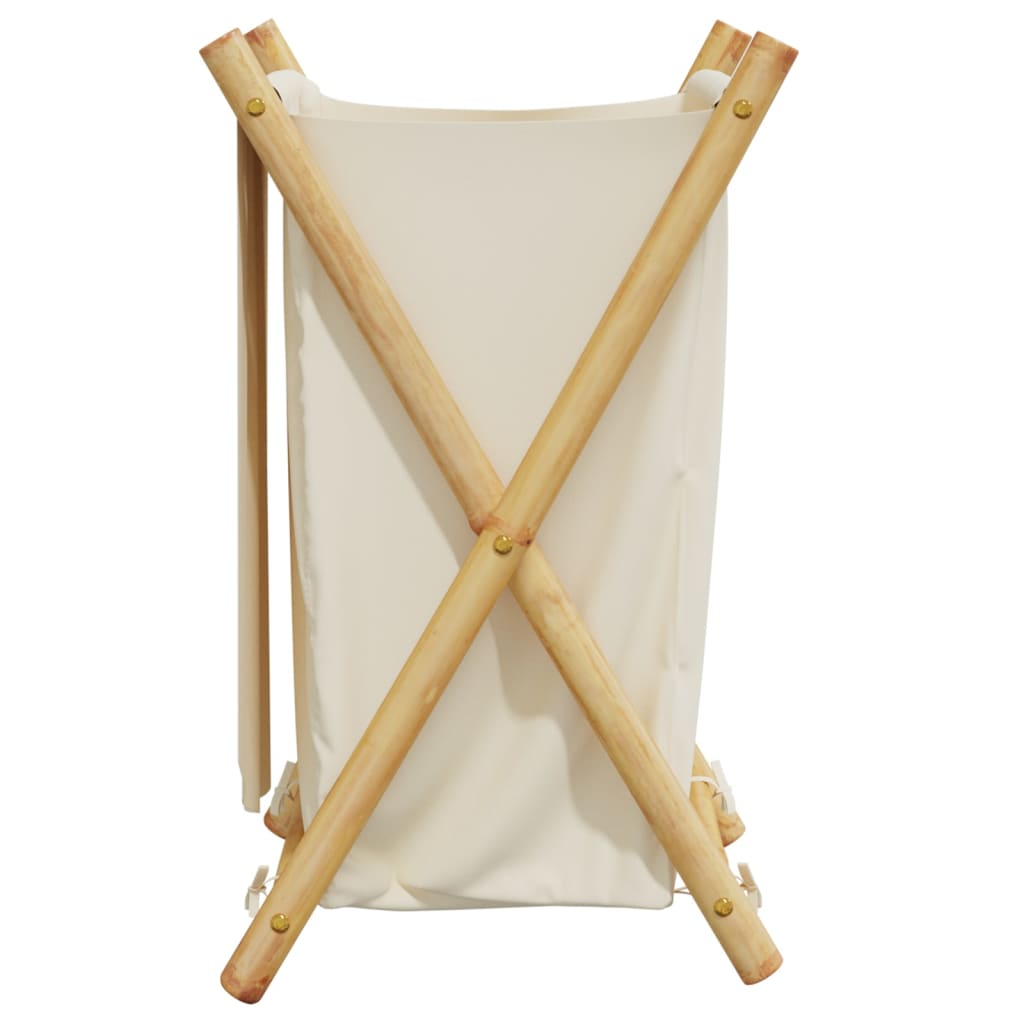 Cream white bamboo laundry basket with foldable design for space-saving storage in small living areas.