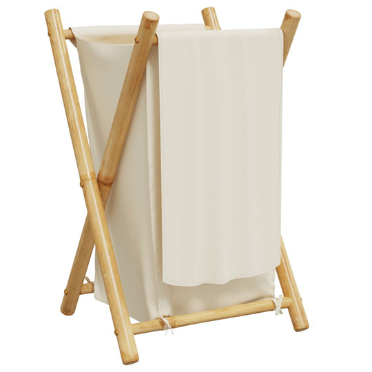 Cream white bamboo laundry basket with foldable design for convenient storage and organization in small spaces.