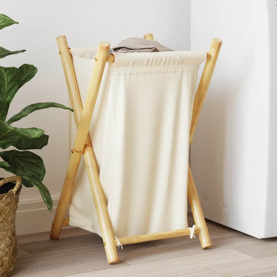 Bamboo laundry basket in cream white, space-saving design, perfect for storing dirty laundry in stylish home decor.