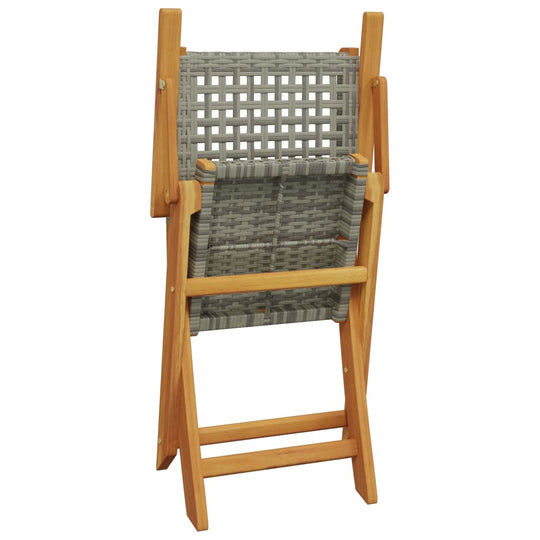 Grey poly rattan folding chair with solid wood frame, perfect for outdoor dining and relaxation in the garden.