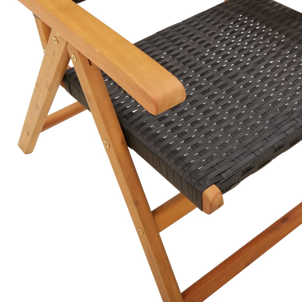 Black poly rattan seat and solid acacia wood armrest of a stylish garden chair for outdoor lounging and dining.