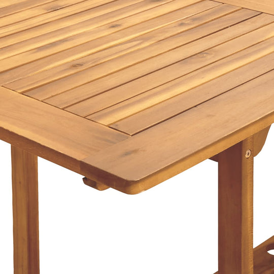 Close-up of a sturdy acacia wood table surface with a slatted design, ideal for outdoor dining and furniture.