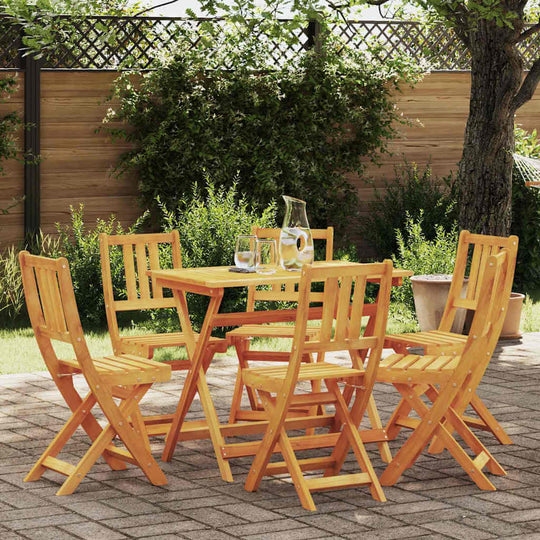 Garden Chair Folding 6 pcs Oil Natural Dubai set in a garden with a table, showcasing modern design and outdoor durability.